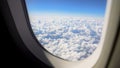 Fluffy cloudscape viewed from airplane window, beautiful nature, vacation trip