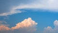 Fluffy cumulus in sunlight clouds in blues sky, colourful cloudy day. nature scenic background