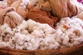 Fluffy cottons and  thread in wood tray Royalty Free Stock Photo