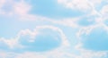 Fluffy cumulus clouds scattered across a light blue sky, diffusing sunlight and creating soft Royalty Free Stock Photo