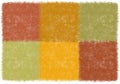 Fluffy door mat with geometrical pattern with weave square elements in brown, orange, green colors , isolated