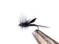 Fluffy fly fishing hook on white background Royalty Free Stock Photo