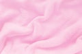 Fluffy Gentle baby pink fabric with waves and folds. Soft pastel Royalty Free Stock Photo