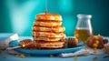 Fluffy Golden Pancakes with Melted Butter and Honey