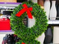 Fluffy green wreath with red bow