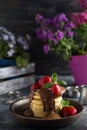 Fluffy pancakes with chocolate & strawberries & strawberries Royalty Free Stock Photo