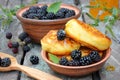 Fluffy pancakes with fresh blackberries