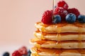 Fluffy Pancakes with Syrup and Berries - Delicious Breakfast Stack