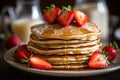 Fluffy pancakes topped with strawberries and syrup Royalty Free Stock Photo