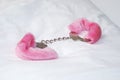 Fluffy pink hand cuffs Royalty Free Stock Photo