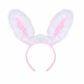 Fluffy pink rabbit ears on a white