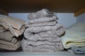 Fluffy towels stacked inside a linen closet Royalty Free Stock Photo