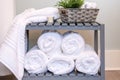 Fluffy white bath towels rolled and stacked Royalty Free Stock Photo