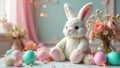 A fluffy white bunny sits serenely amidst pastel easter eggs and delicate spring blossoms, creating a charming springtime scene. Royalty Free Stock Photo