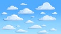 Fluffy white clouds against a bright blue sky Royalty Free Stock Photo