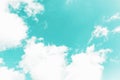 White clouds on the aquamarine aqua menthe color sky background