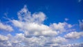 Fluffy white clouds on blue sky. Heavenly Landscape