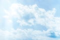 Fluffy white clouds on a clear blue background Royalty Free Stock Photo
