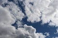 Fluffy white clouds with dark blue sky Royalty Free Stock Photo