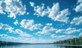 Fluffy white clouds drifting lazily across a brilliant blue sky Royalty Free Stock Photo