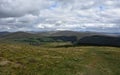 Fluffy White Clouds Over Rolling Hills in England Royalty Free Stock Photo