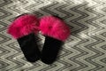 Fluffy women`s slippers on carpet, flat lay. Space for text
