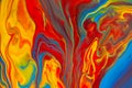 Fluid art painting. Blue, golden, red, yellow, orange.