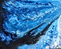 Fluid art painting in different shades of blue