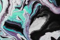Fluid Art. White black and neon turquoise waves and curls. Abstract marble background or texture