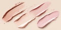 Fluid cosmetics textures featuring spread highlighter and foundation cream Royalty Free Stock Photo