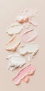 Fluid cosmetics textures featuring spread highlighter and foundation cream Royalty Free Stock Photo