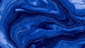Fluid dynamic patterns in various shades of blue create a marbled effect Royalty Free Stock Photo