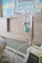 The fluid intravenous drip saline dropping for the admit patient in the room at hospital Royalty Free Stock Photo