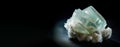 Fluorapophyllite-K is a rare precious natural stone on black background. AI generated. Header banner mockup with space.