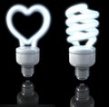 Fluorescent lamps, spiral shaped, heart shaped, white glow, 3d rendering on dark background Royalty Free Stock Photo