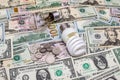 Fluorescent Light bulb on dollar Royalty Free Stock Photo