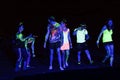 Fluorescent light splashed revelers of the Glow Run Port Elizabeth in South Africa