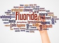 Fluoride word cloud and hand with marker concept Royalty Free Stock Photo