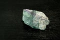 Fluorite fluorspar from Brazil. Natural mineral stone on black background. Mineralogy, geology, magic of stones, semi