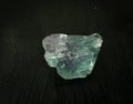 Fluorite fluorspar from Brazil. Natural mineral stone on black background. Mineralogy, geology, magic of stones, semi