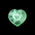 Green fluorite heart on black background