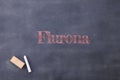 Flurona written on a blackboard. Covid and flu infection
