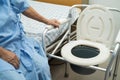 Flush toilet and shower chair in bathroom for old elder people Royalty Free Stock Photo