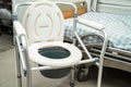 Flush toilet and shower chair in bathroom for old elder people Royalty Free Stock Photo