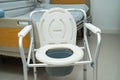 Flush toilet and shower chair in bathroom for old elder people Royalty Free Stock Photo