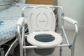 Flush toilet and shower chair in bathroom for old elder people Royalty Free Stock Photo