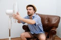 Flushed man feeling hot Royalty Free Stock Photo