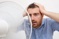 Flushed man feeling hot Royalty Free Stock Photo