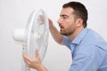 Flushed man feeling hot Royalty Free Stock Photo