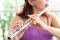 Flute :  A closeup of hands of a musician playing the flute, detail shot, classical music, wind instrument performance player up Royalty Free Stock Photo